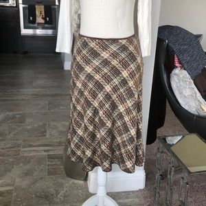 Soft brown and cream skirt with teal decoration.